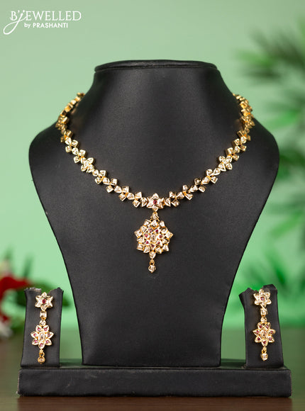 Attigai impon necklace with floral pendant in red & white stones