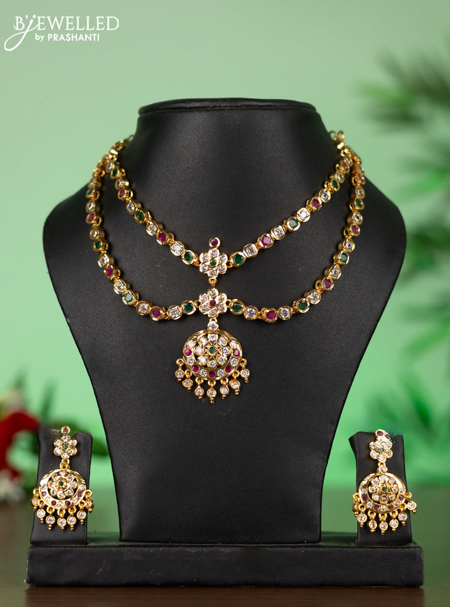 Attigai impon necklace with floral pendant in red,green and white stones