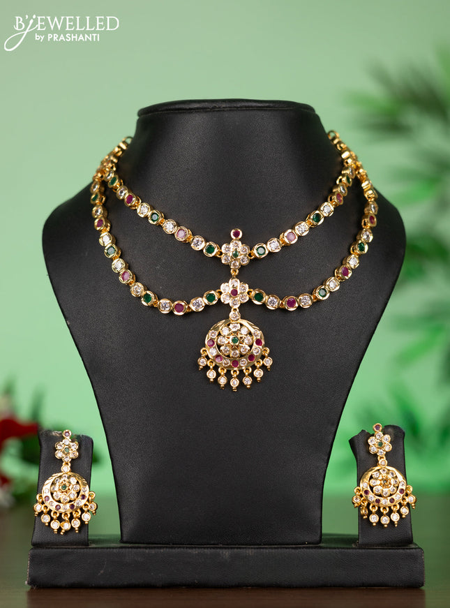 Attigai impon necklace with floral pendant in red,green and white stones