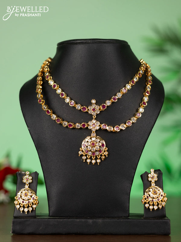 Attigai impon necklace with floral pendant in red and white stones