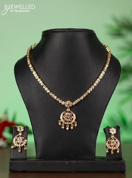 Attigai impon necklace with floral pendant in red and white stones