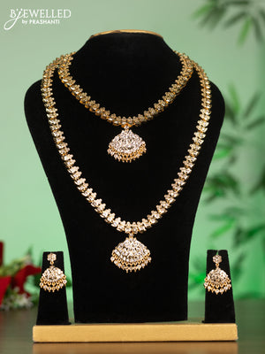 Attigai combo set with cz stones and hangings in gold finish