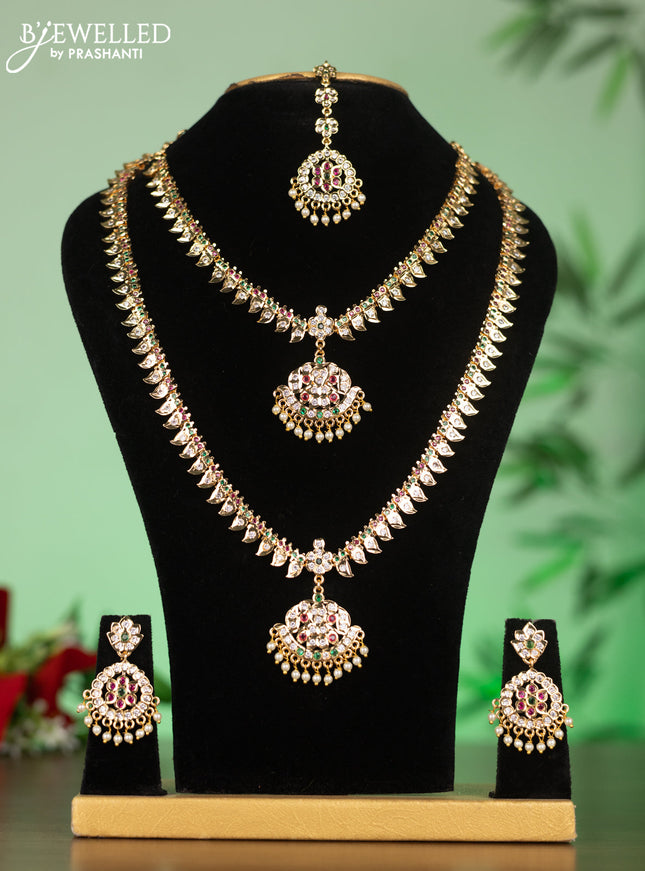 Attigai combo set with kemp & cz stones and pearl hangings in gold finish
