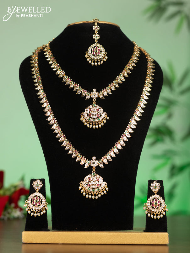 Attigai combo set with kemp & cz stones and pearl hangings in gold finish