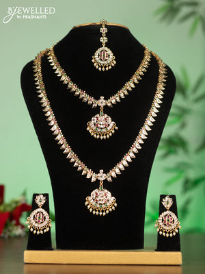 Attigai combo set with kemp & cz stones and pearl hangings in gold finish