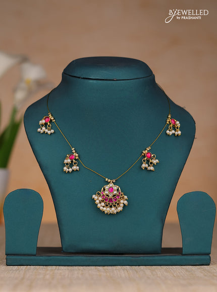 Invisble chain chandbali type with jadau kundan stones and pearl hangings