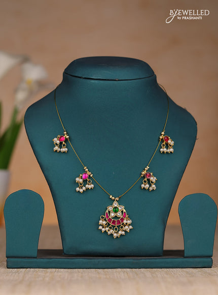 Invisble chain chandbali type with jadau kundan stones and pearl hangings