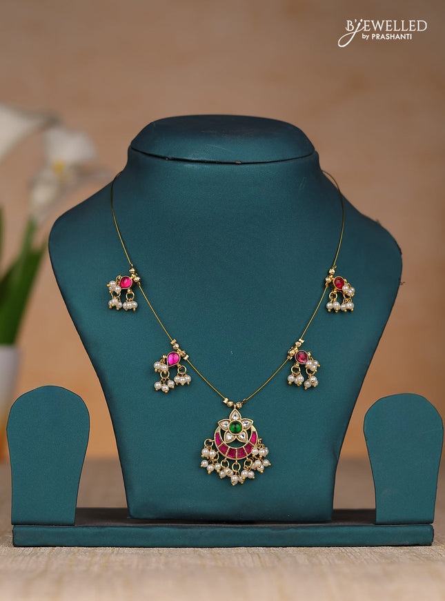 Invisble chain chandbali type with jadau kundan stones and pearl hangings