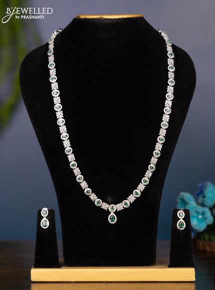 Zircon haaram in oval design with green stones