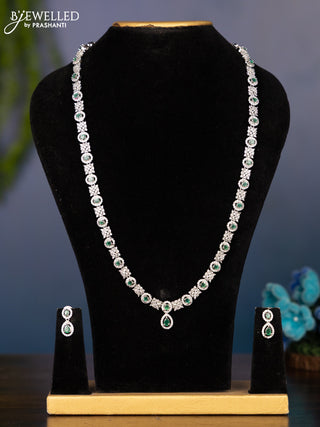 Zircon haaram in oval design with green stones