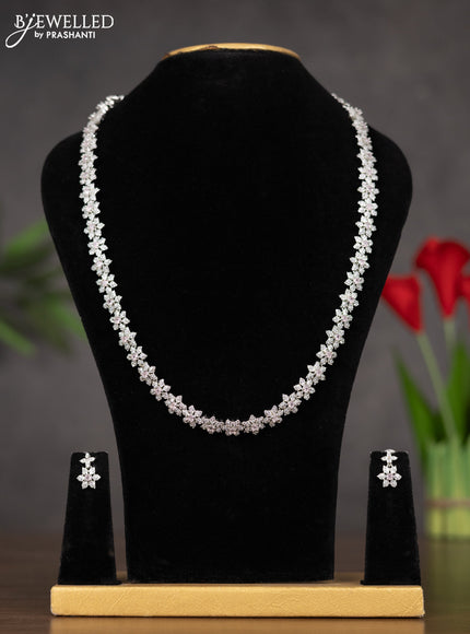 Zircon haaram with floral design white and pastel pink stones