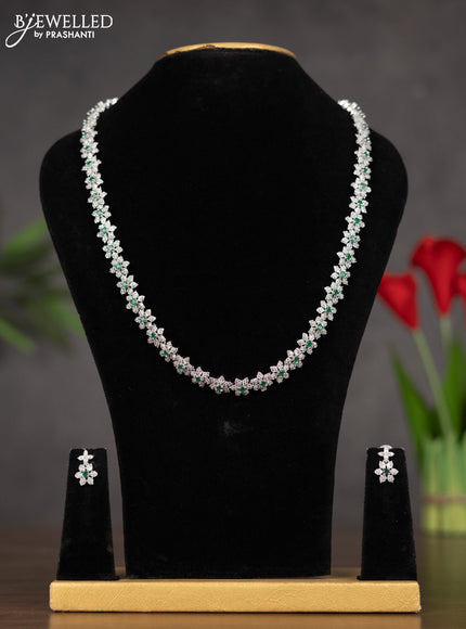 Zircon haaram with floral design white and green stones