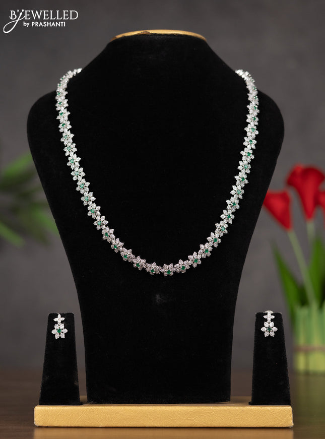 Zircon haaram with floral design white and green stones