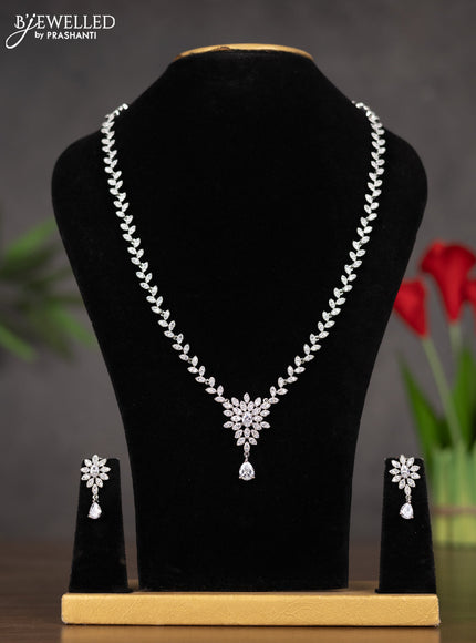 Zircon haaram with floral design in white stones