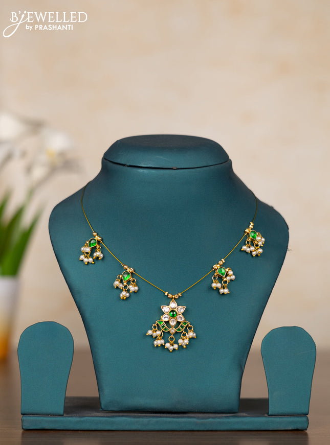 Invisible chain with floral pendant in green jadau kundan stones and pearl hanging