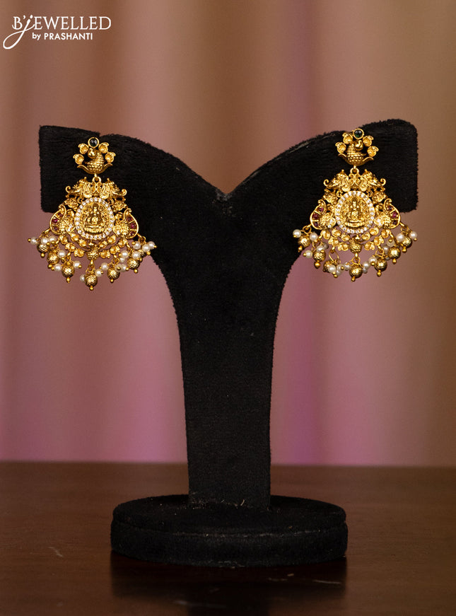 Pearl haaram with lakshmi pendant in kemp stones and golden ball hanging
