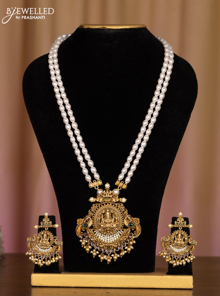 Pearl white haaram with lakshmi pendant in kemp stones and golden ball hanging