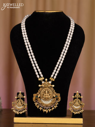 Pearl white haaram with lakshmi pendant in kemp stones and golden ball hanging