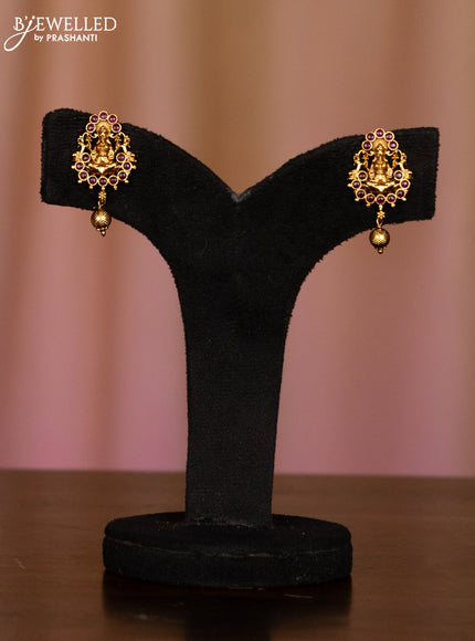 Pearl white haaram with lakshmi pendant in fully kemp stones and golden ball hanging