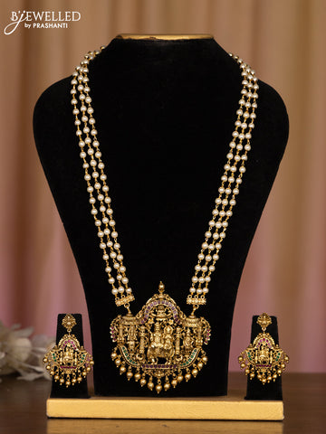 Pearl haaram with lakshmi pendant in multicolor stones and golden ball hanging
