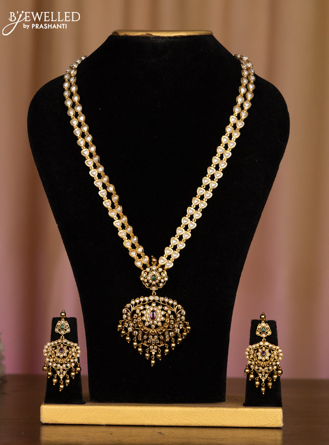 Pearl haaram with floral pendant in multicolor stones & golden ball hanging