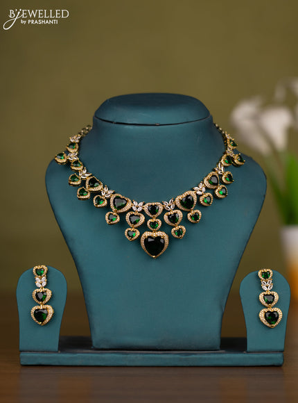 Necklace heart shape design with emerald and cz stones in victorian finish
