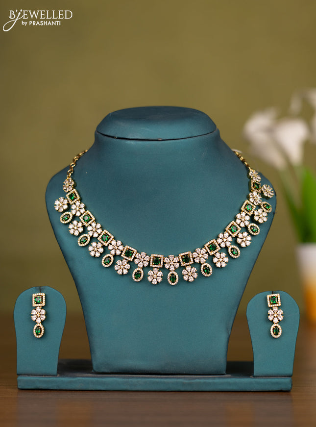 Necklace floral design with emerald and cz stones in victorian finish