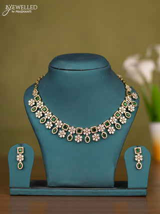 Necklace floral design with emerald and cz stones in victorian finish