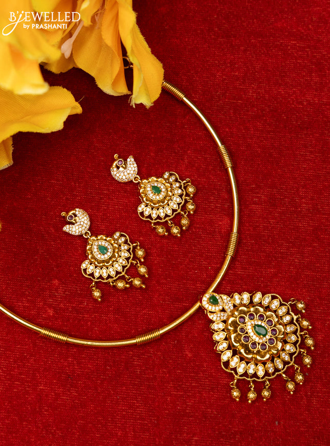 Ring type choker with floral design in multicolor kemp stones and golden ball hanging