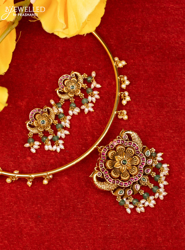 Ring type choker with peacock floral design in multicolor kemp stones and pearl hanging