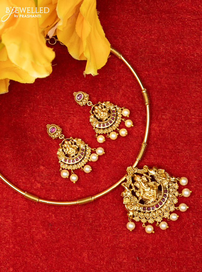 Ring type choker with ganesha design in red kemp stones and pearl hanging