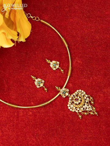 Ring type choker with chandbali design in multicolor kemp stones and golden ball hanging