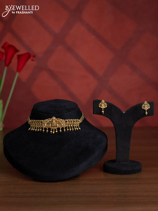 Antique choker with lakshmi design and golden beads hangings