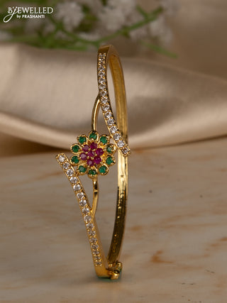 Bracelets with kemp and cz stones in gold finish