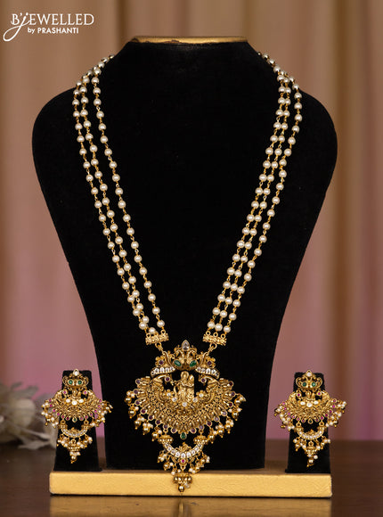 Pearl haaram radha krishna pendant with kemp and cz stones in pearl & golden beads hangings