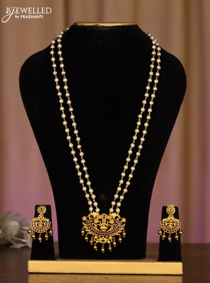 Pearl haaram lakshmi pendant with kemp stones in golden beads hangings