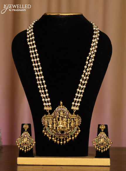 Pearl haaram shivan parvathi pendant with kemp stones in golden beads hangings