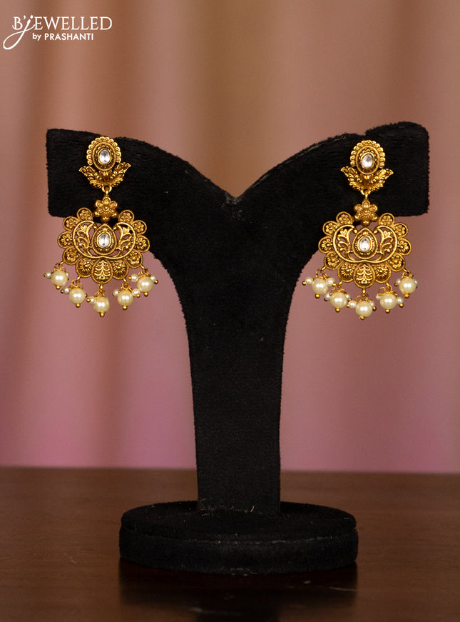 Pearl haaram floral design with kundan stones and pearl hangings