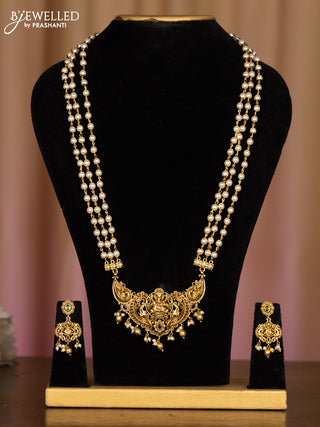 Pearl haaram ganesha pendant with kemp stones in pearl & golden beads hangings