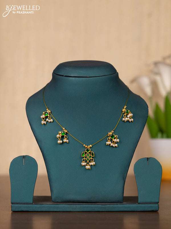 Invisible chain with green kemp jadau stones in pearl hangings without earrings