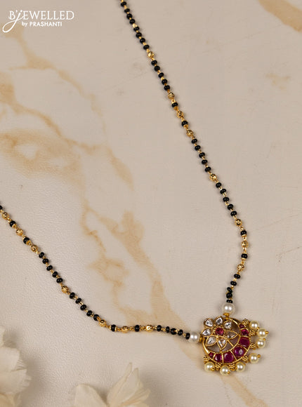 Mangalsutra chandbali pendant with ruby and kundan stones in pearl hangings