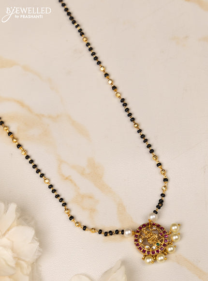 Mangalsutra with lakshmi pendant and ruby and cz stones in pearl hangings