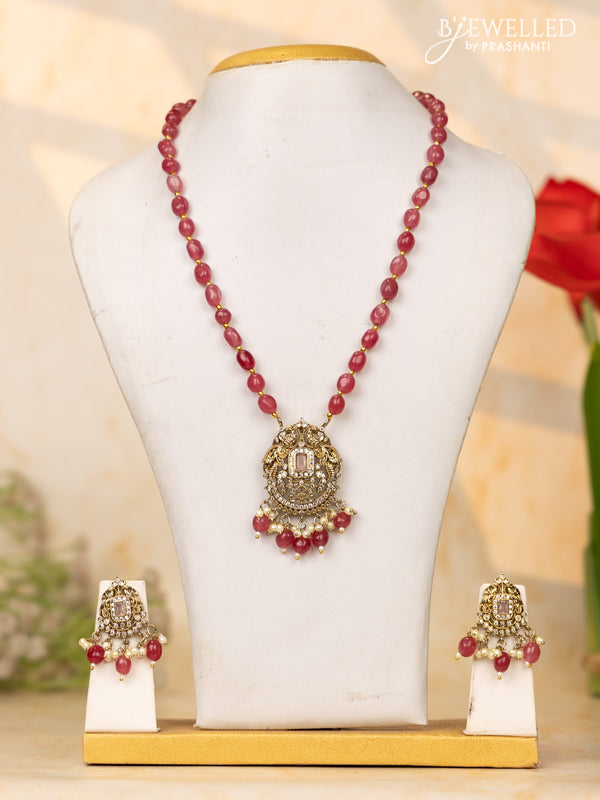 Beaded pink necklace with emerald & cz stones and beads hangings in victorian finish