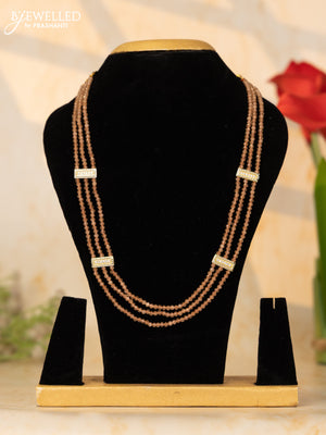 Beaded peach necklace with cz stones