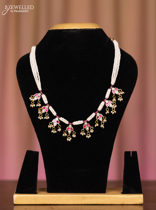 Pearl necklace with pink jadau kundsn stones in pearl hangings without earrings