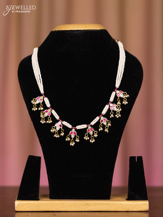 Pearl necklace with pink jadau kundsn stones in pearl hangings without earrings