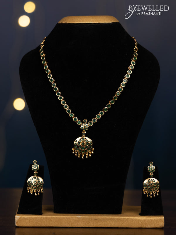 Impon attigai necklace with emerald stones in golden beads hangings