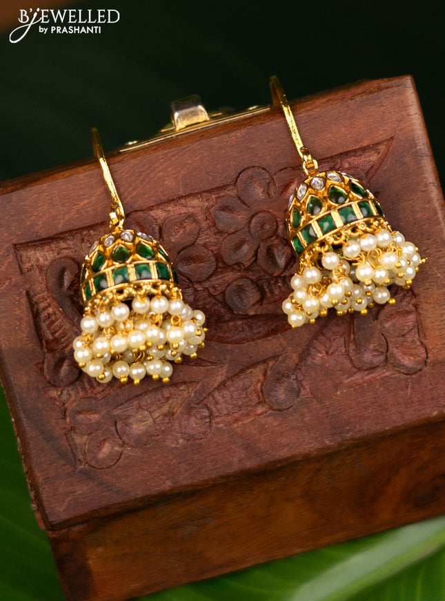 Antique hanging type jhumka with green kemp & kundan stones and pearl hangings