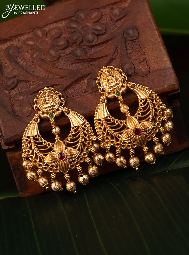 Antique earrings lakshmi design with kemp stones and golden beads hanging