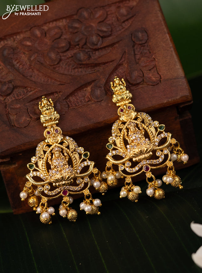 Antique earrings lakshmi design with kemp & cz stones and golden beads hanging